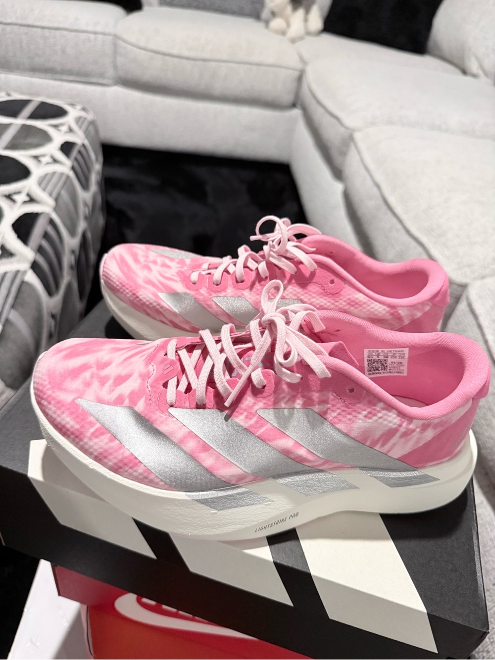 adidas Adizero Evo SL Pink Women's Athletic Running Sneakers with Silver Stripes